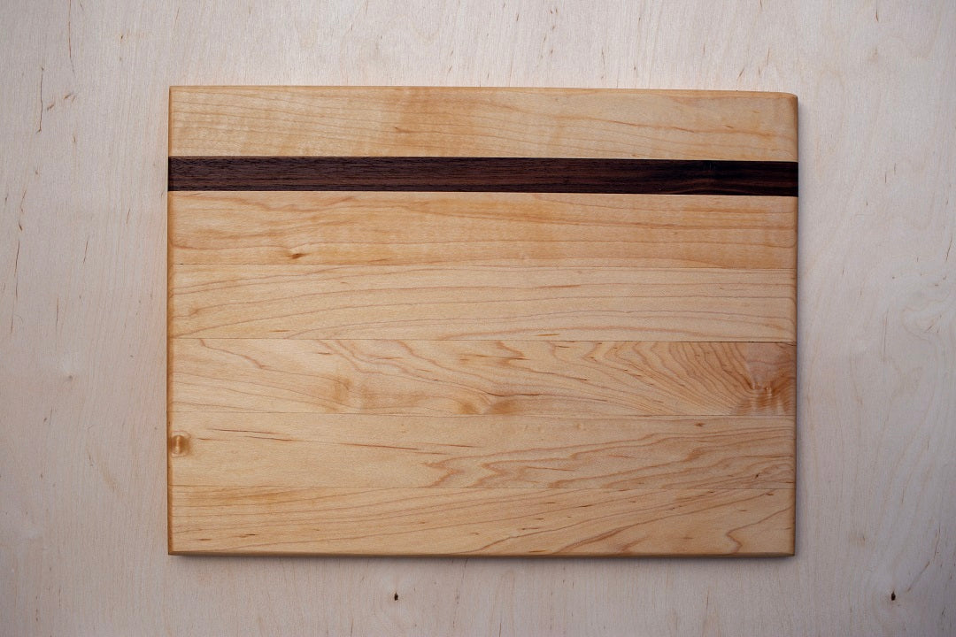 Edge grain maple board with walnut accent strip